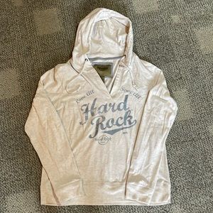 Hard Rock woman’s XL, tan, long-sleeved, hooded cotton shirt